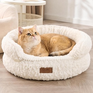 image:imageFUKUMARU Round Cat Bed Plush Washable Calming Dog Bed with Low Entry  Raised Bolster Small Dog Bed Soft Cozy Donut Cat Bed for Indoor Cats Faux Rabbit Fur amp AntiSlip Bottom 20 Inch CamelCream